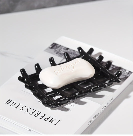 Image d'ambiance porte savon céramique effet filet noir avec savon