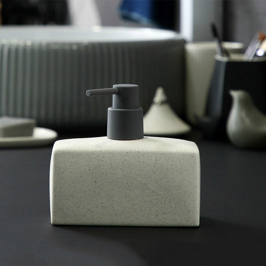 Petit distributeur de savon contemporain et uni